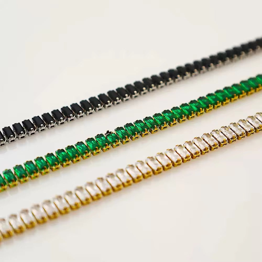 Green tennis bracelet 18k